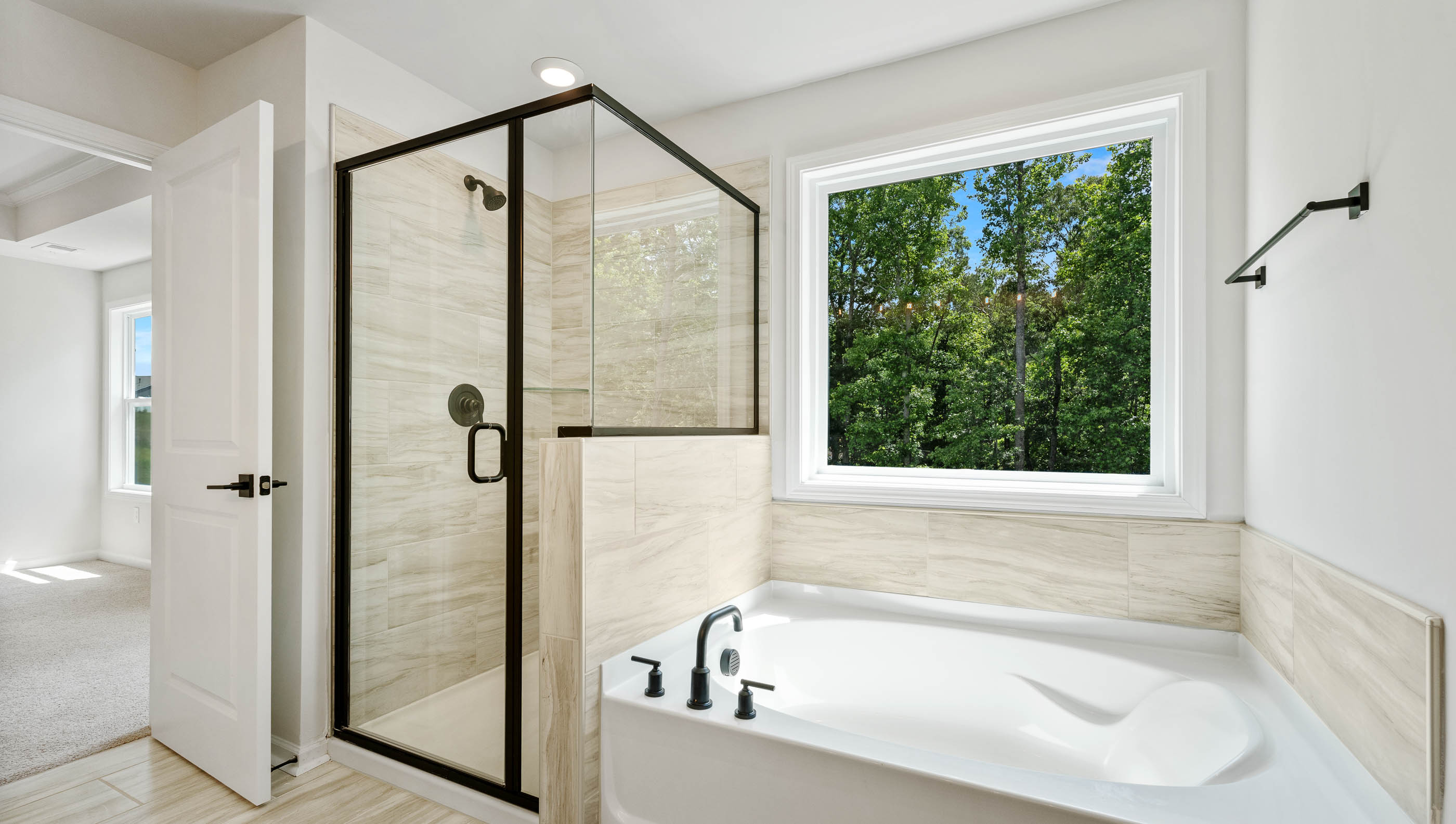 Primary bathroom with walk-in shower, garden tub optional.