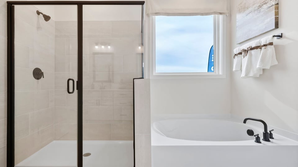 Primary bathroom with double vanity sinks.