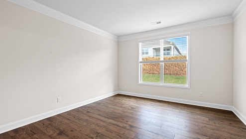 Family room with windows.