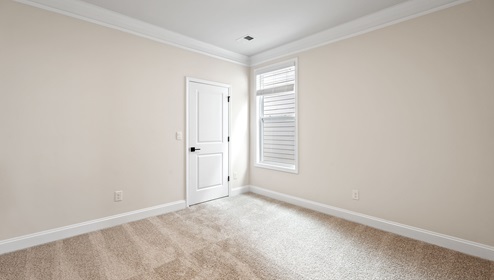 Bedroom with windows.
