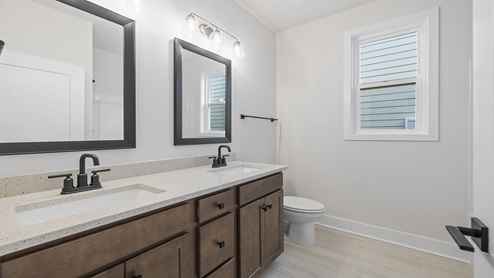 Bathroom with double vanity sinks.