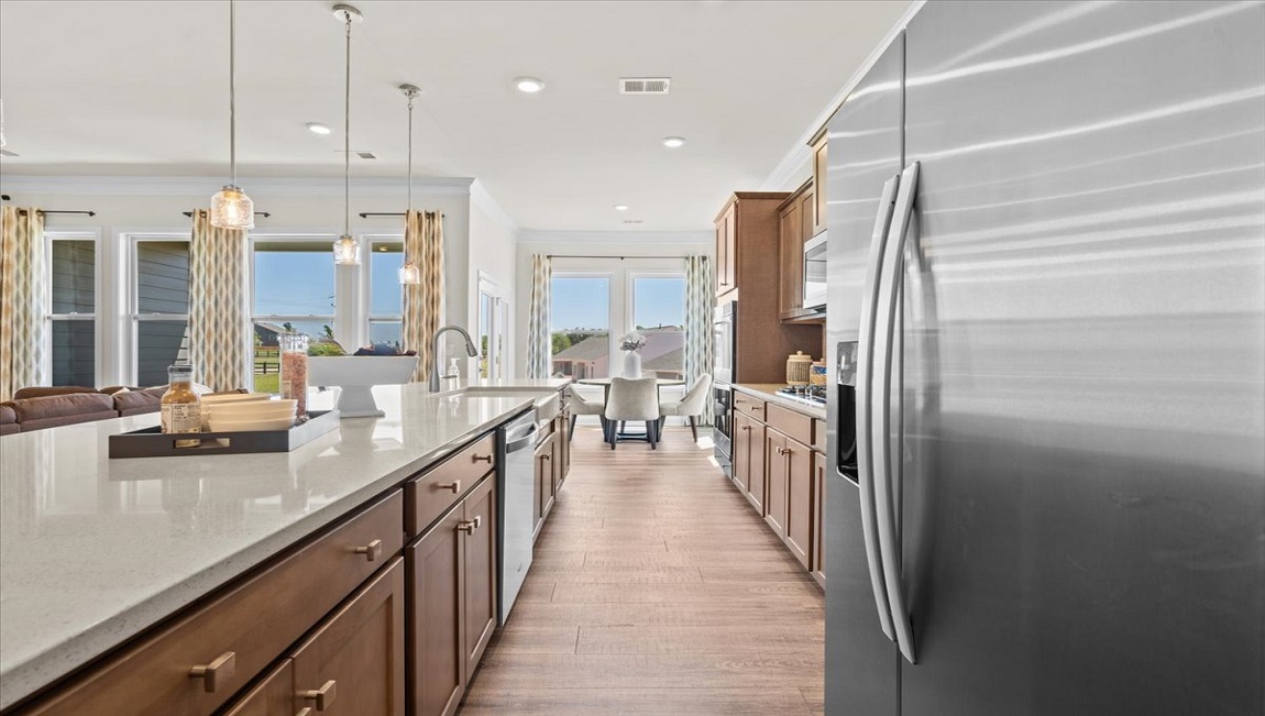 Kitchen with island and cabinets.