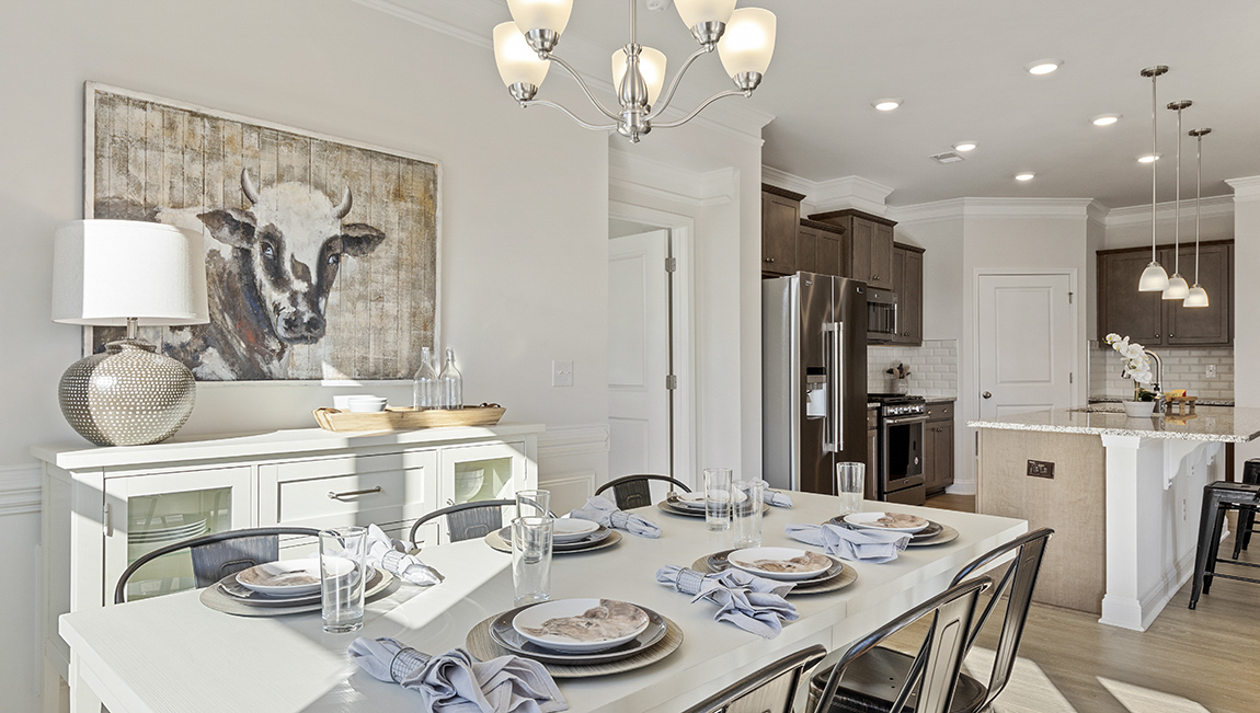 Dining room with view of kitchen.