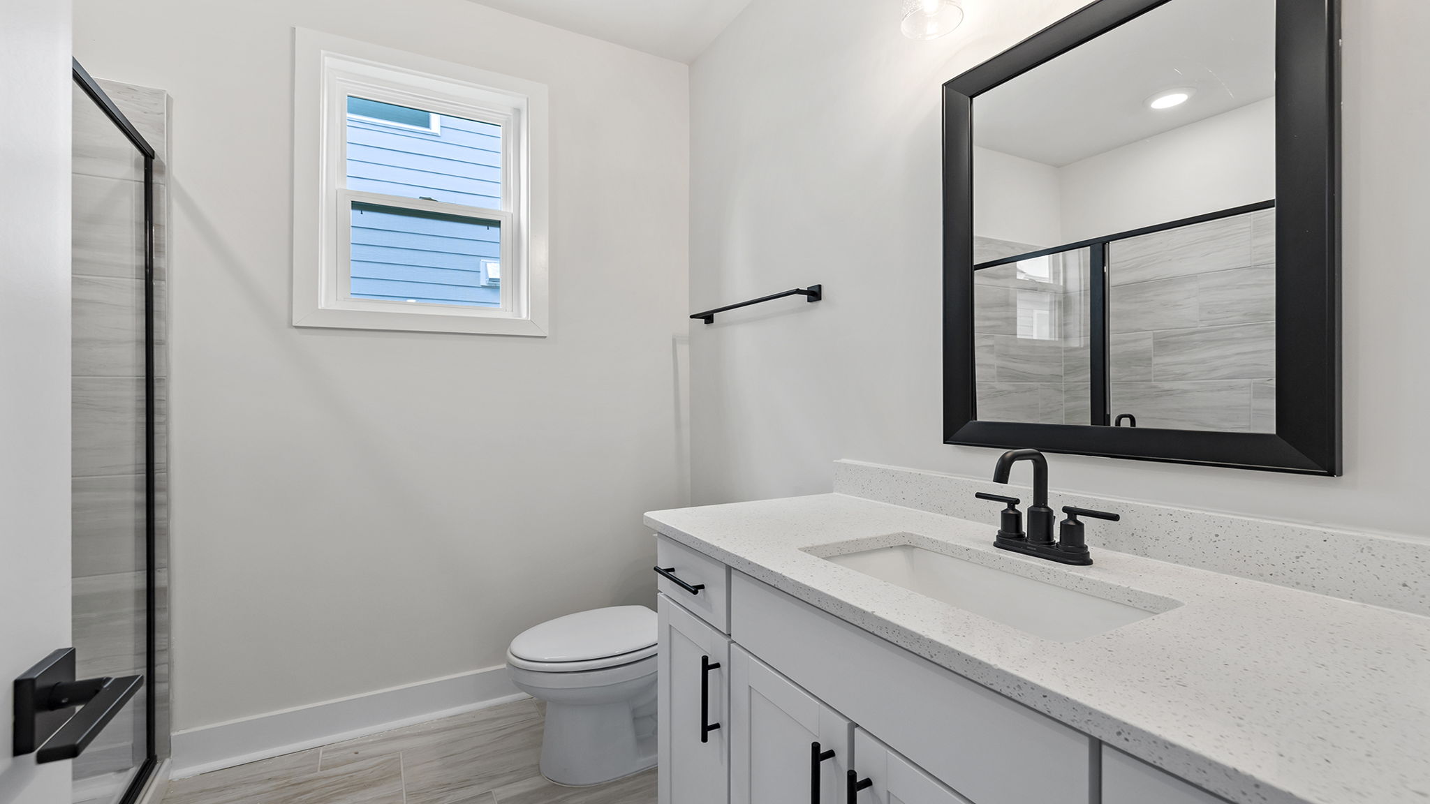 Full bathroom on main level with walk-in shower.