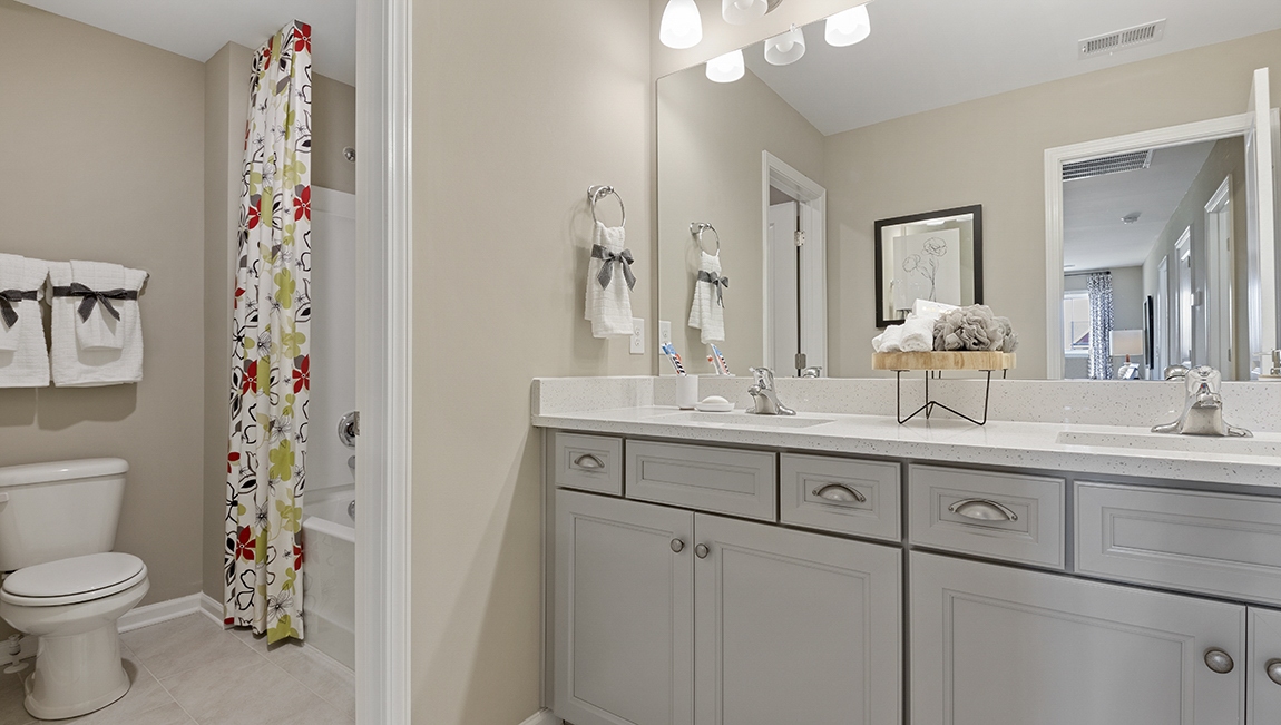 Bathroom with double vanity sinks.