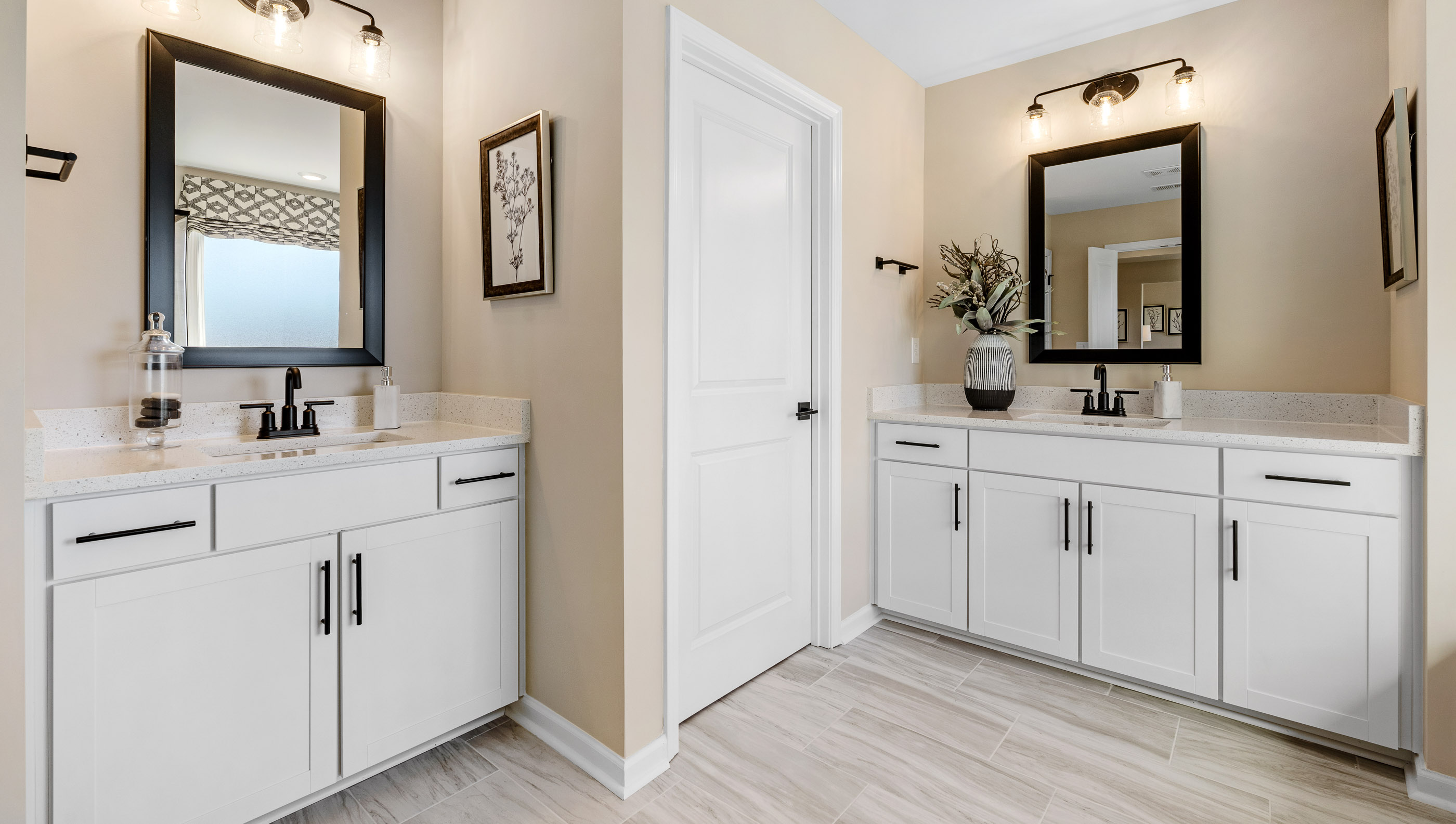 Primary bathroom with double vanity sinks.