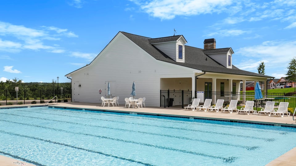 Pool amenity with chairs.