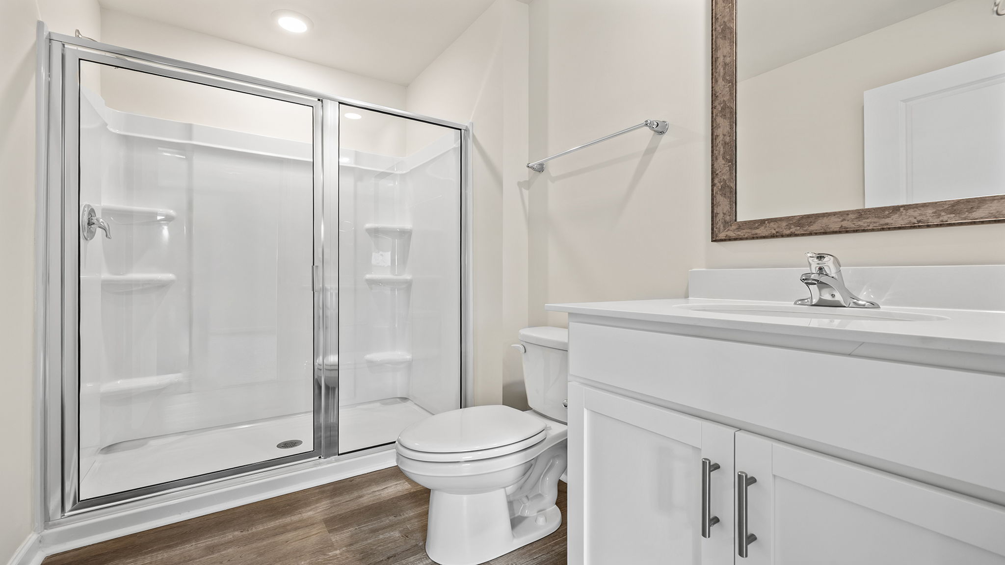 Primary bathroom with walk-in shower.