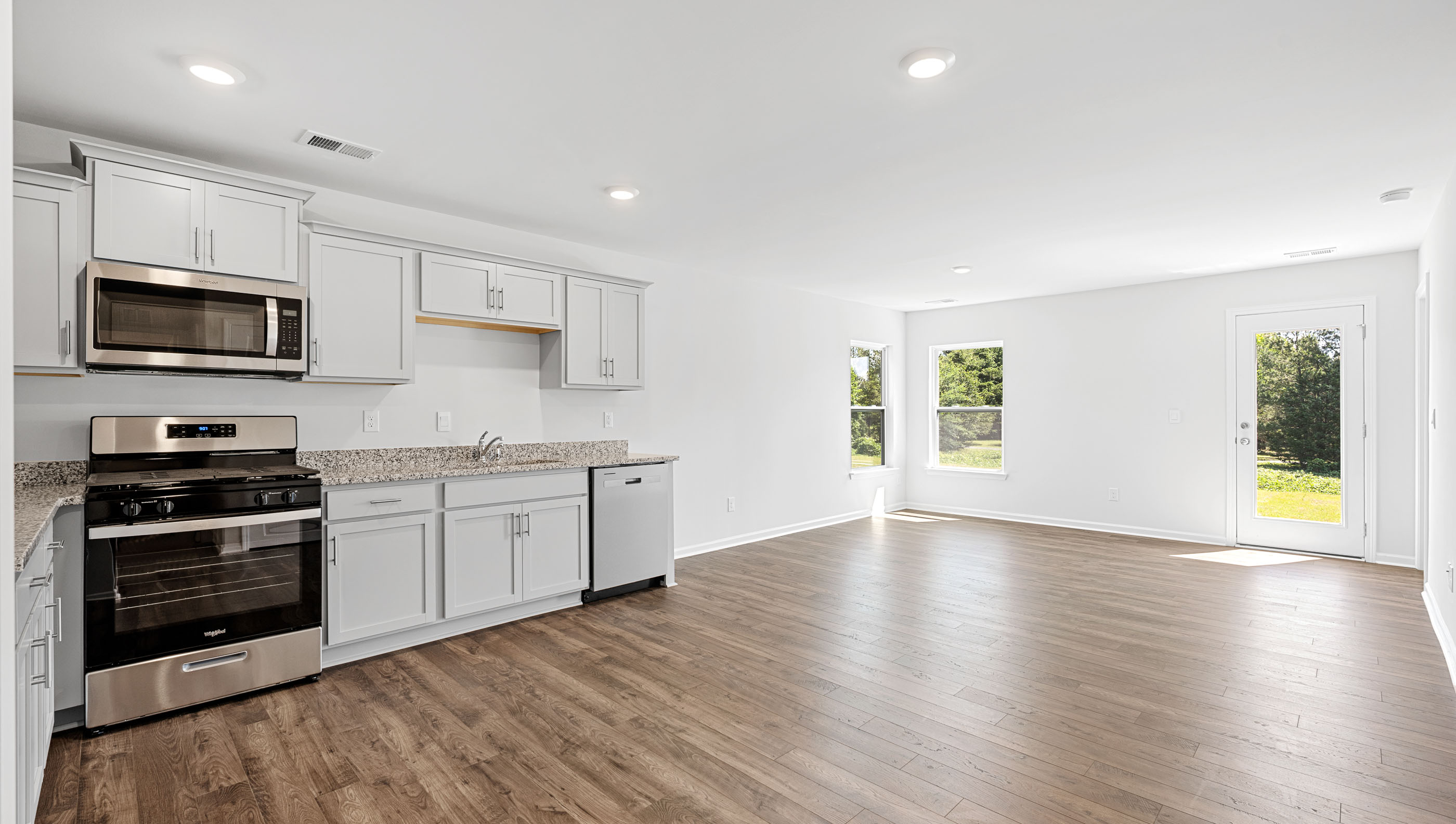 View of open floor plan and windows.