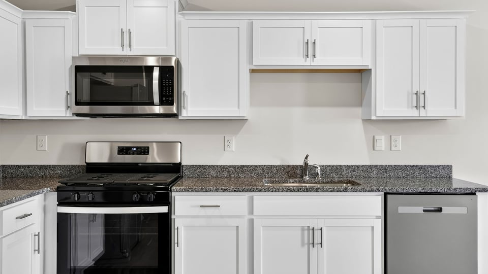Kitchen with stainless steel appliances.