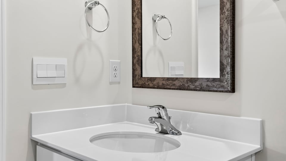Bathroom with single vanity sink.