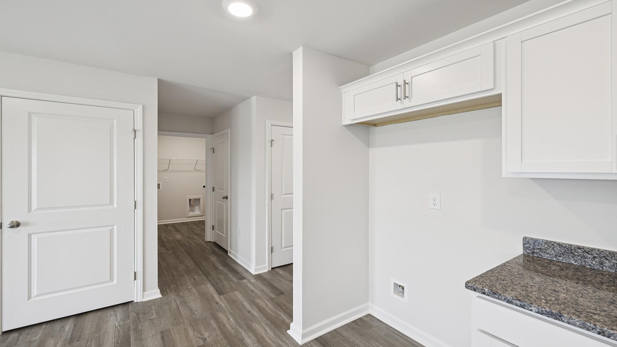Kitchen with cabinets and appliances.
