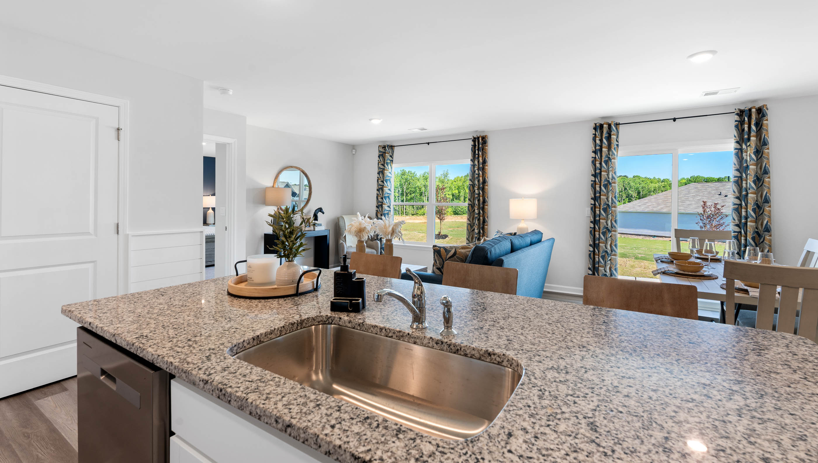 Kitchen with island and cabinets.