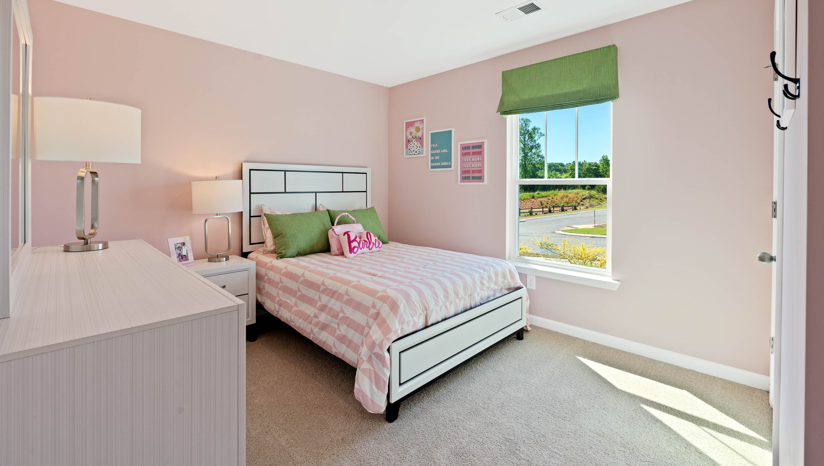 Bedroom with carpet and window.