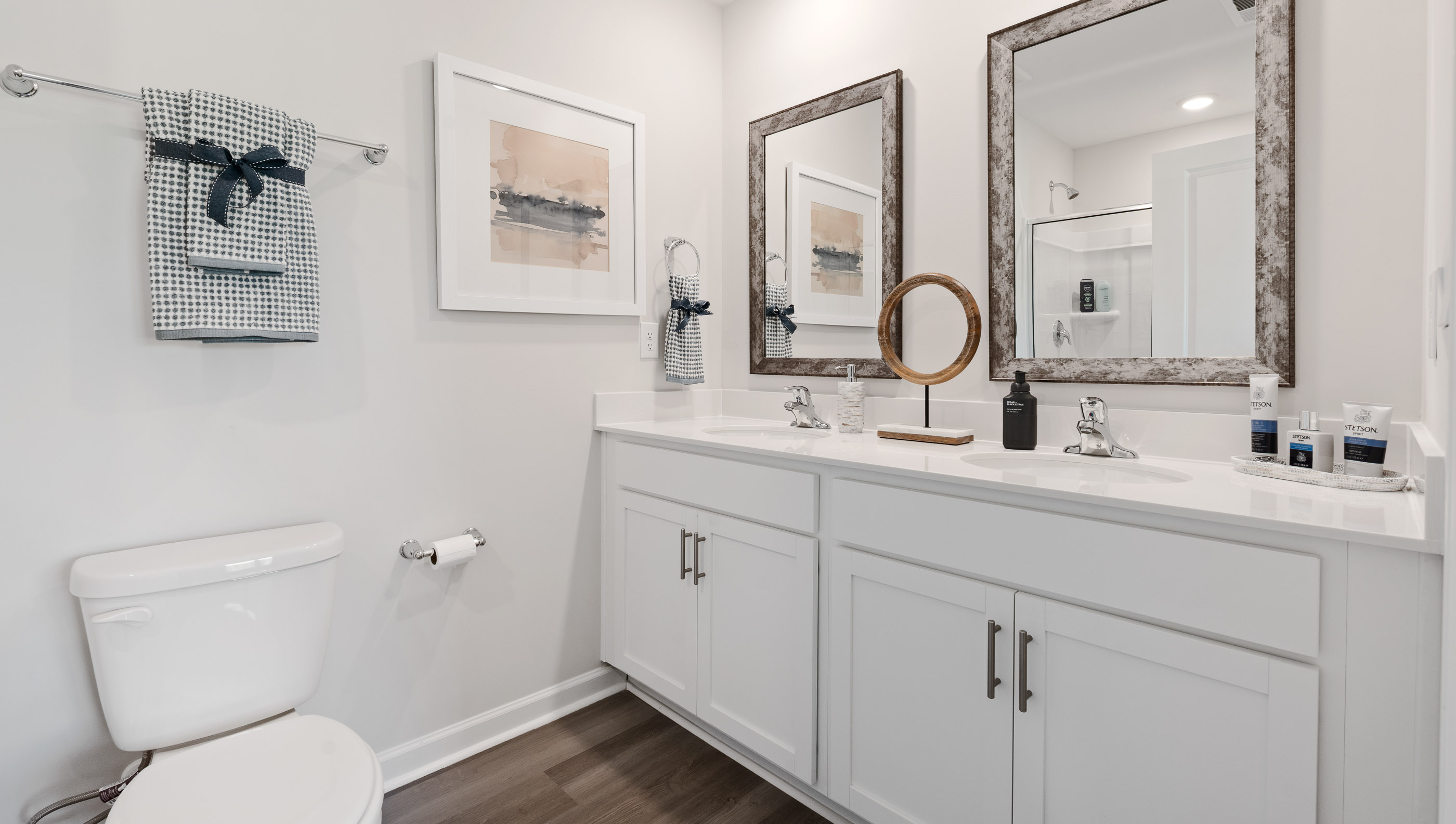 Primary bathroom with double vanity sink.