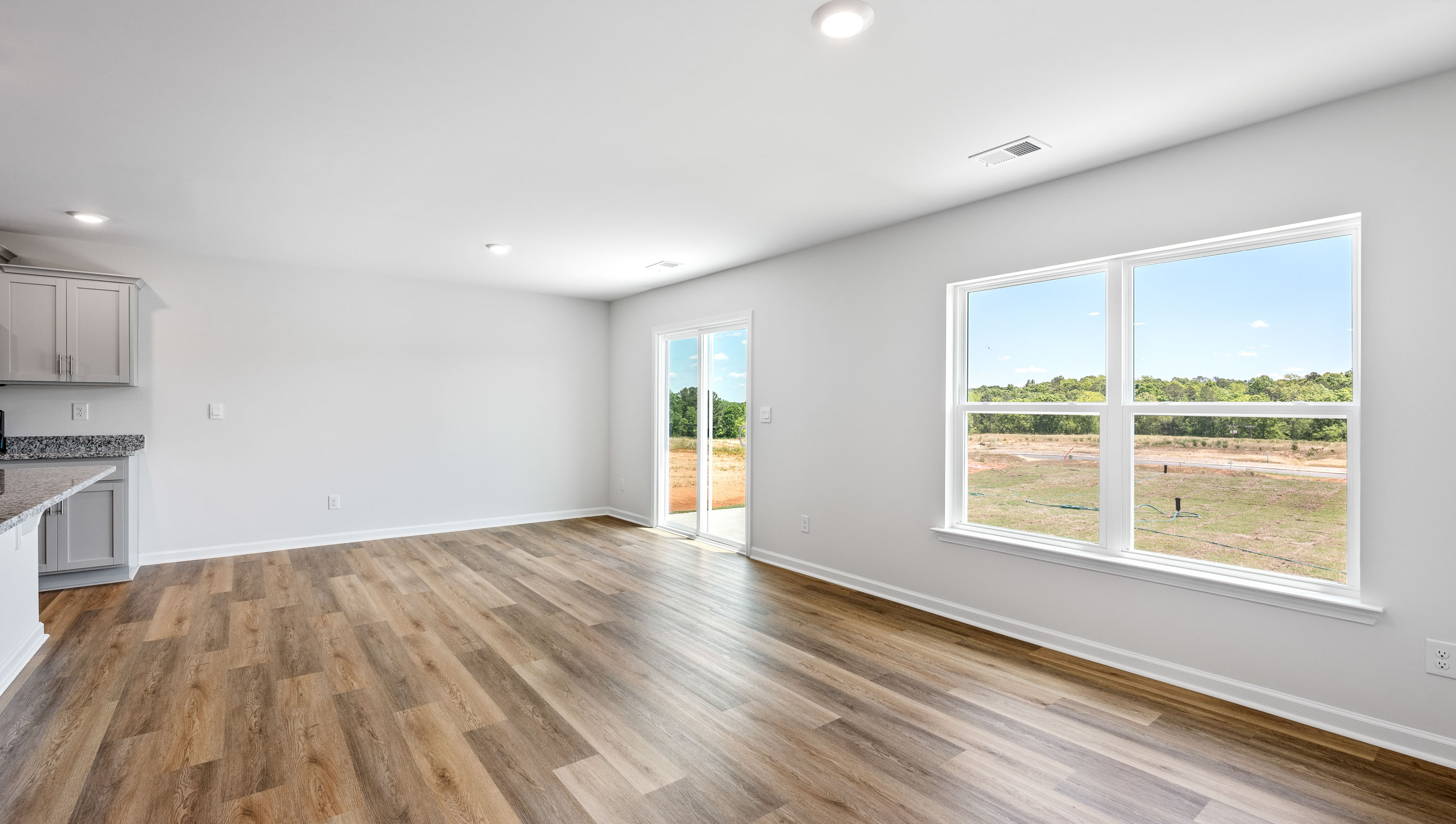 View of the dining area and doors to outside patio.