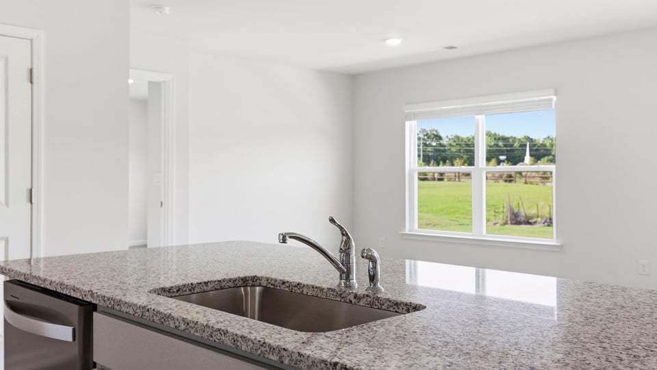 Bathroom with stainless steel appliance.