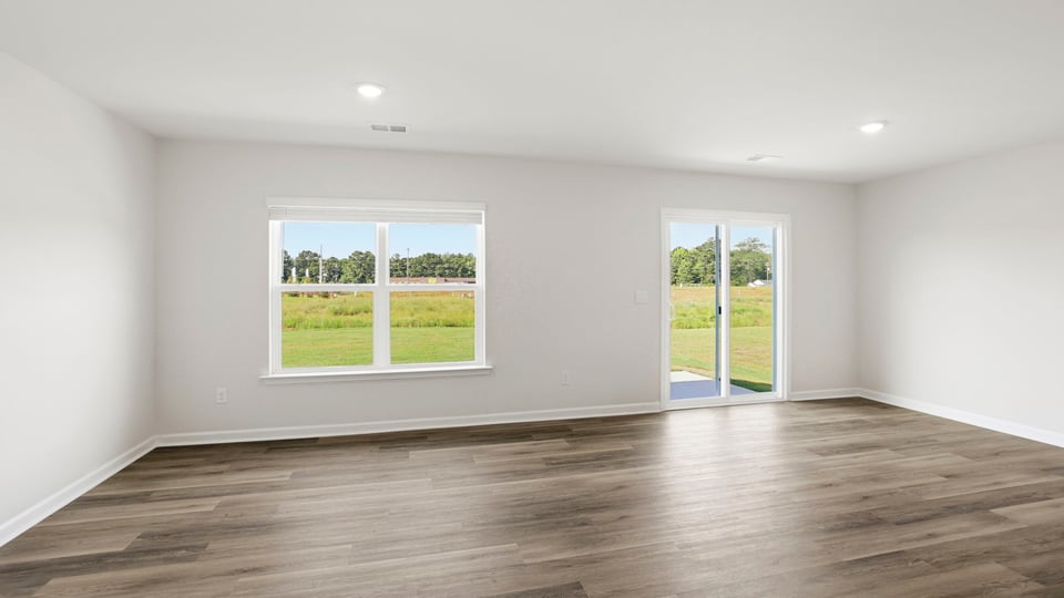 Family room with windows.