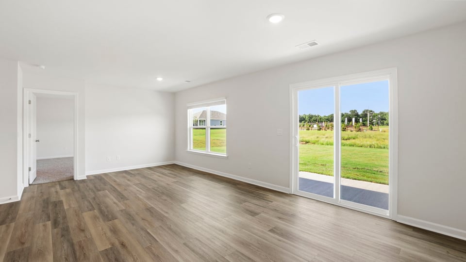 Family room with windows.