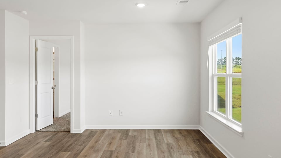 Family room with windows.