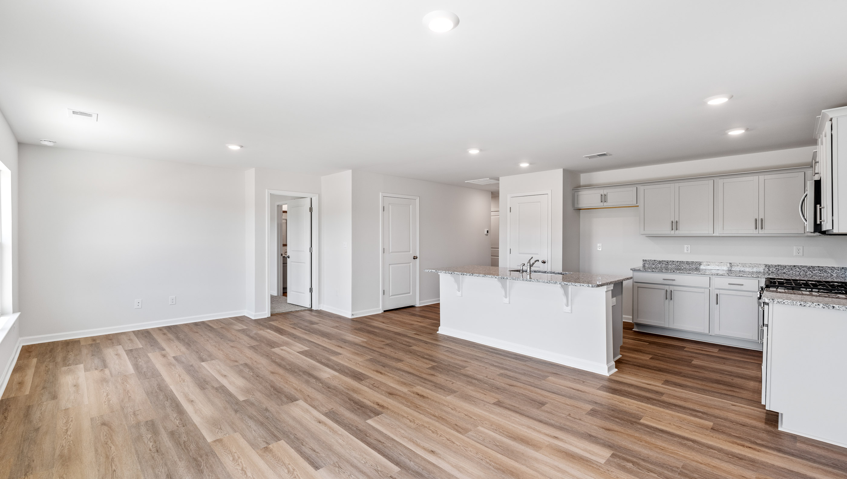 Family room with large windows.