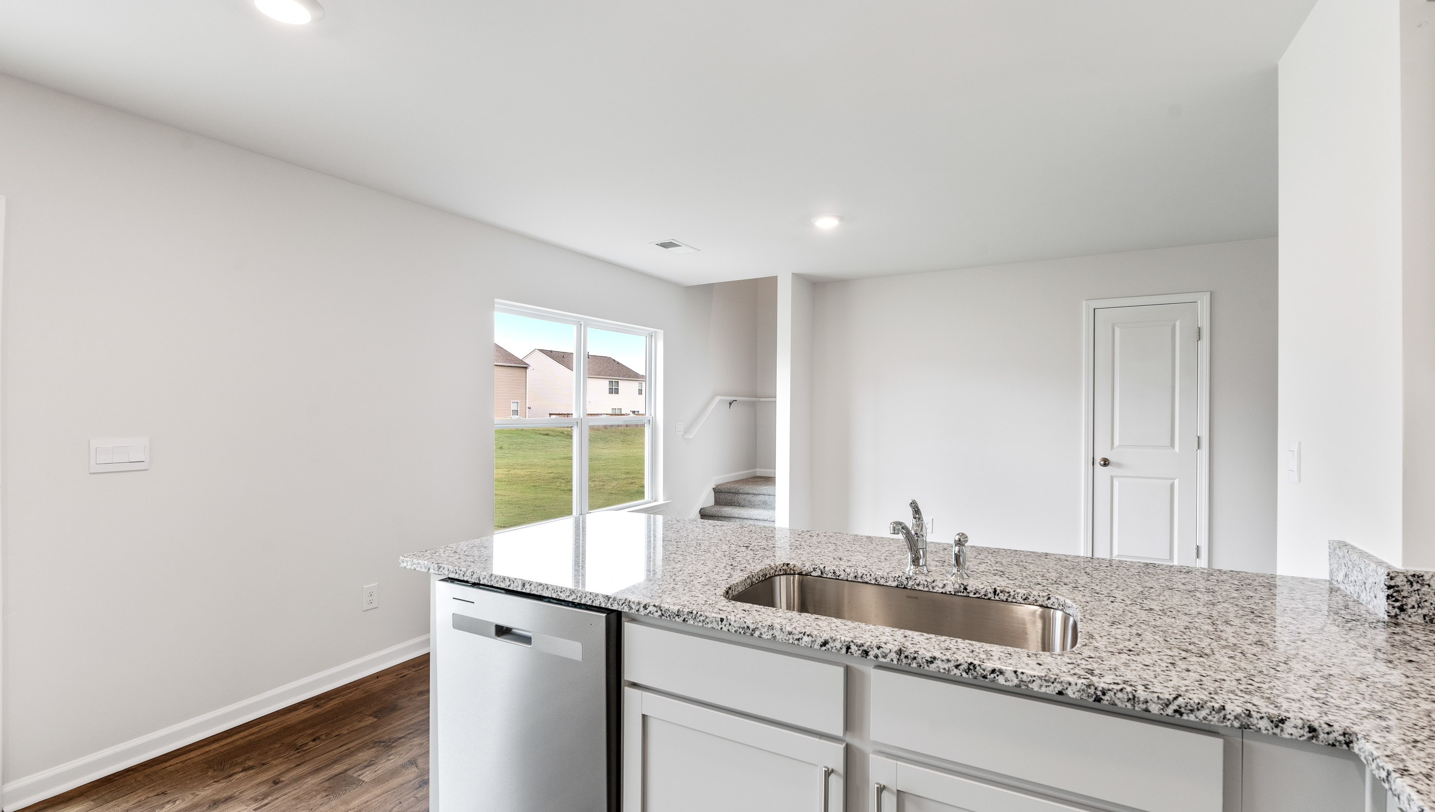 View from kitchen into the dining area.