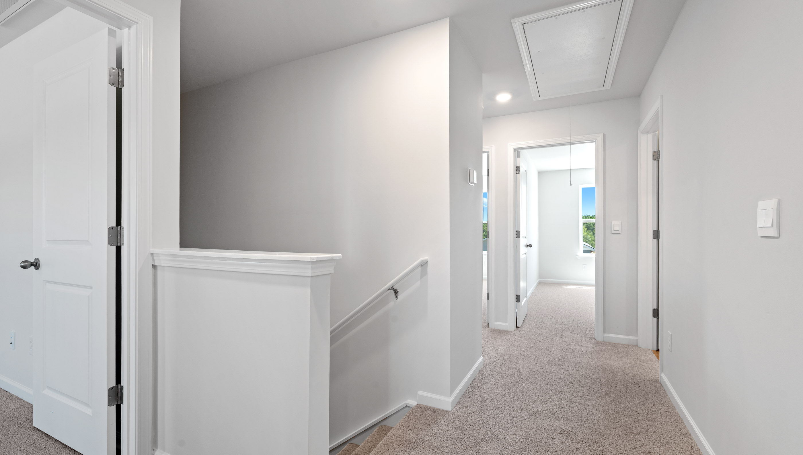 Top of stairs to second level.