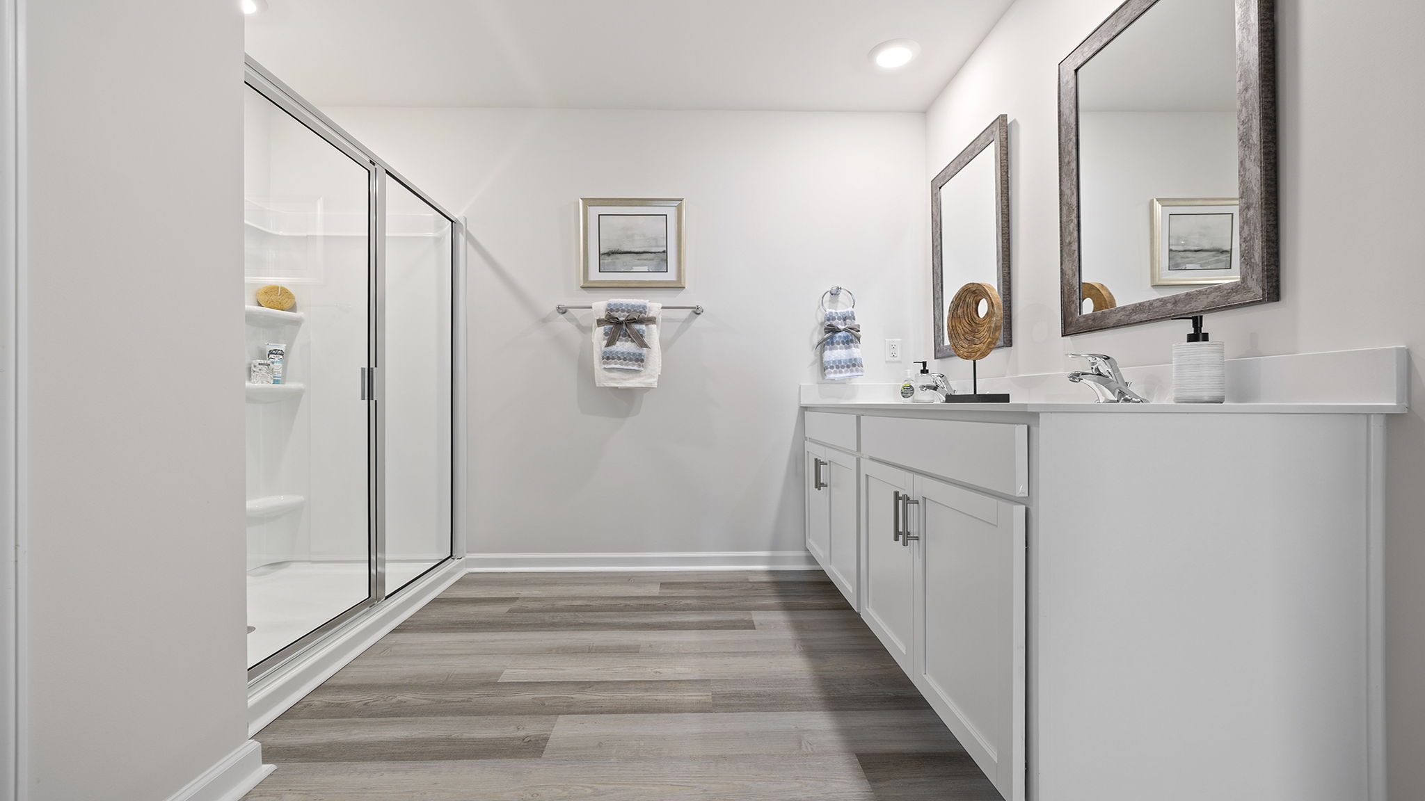 Primary bathroom with double vanity sinks.