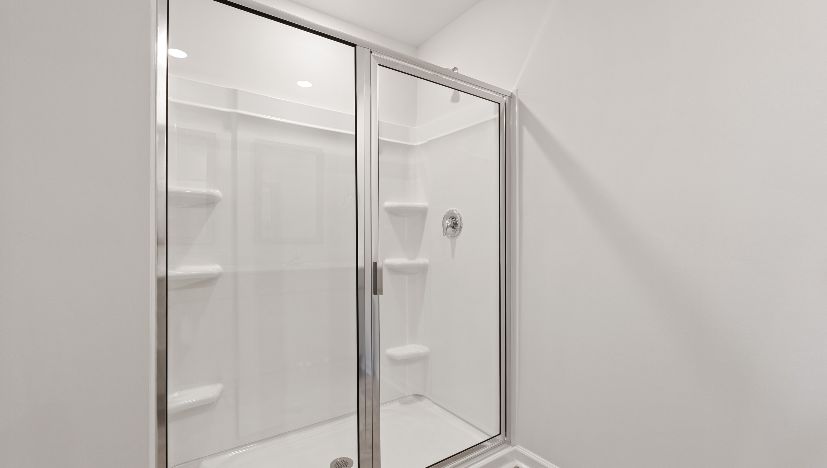 Primary walk-in shower.