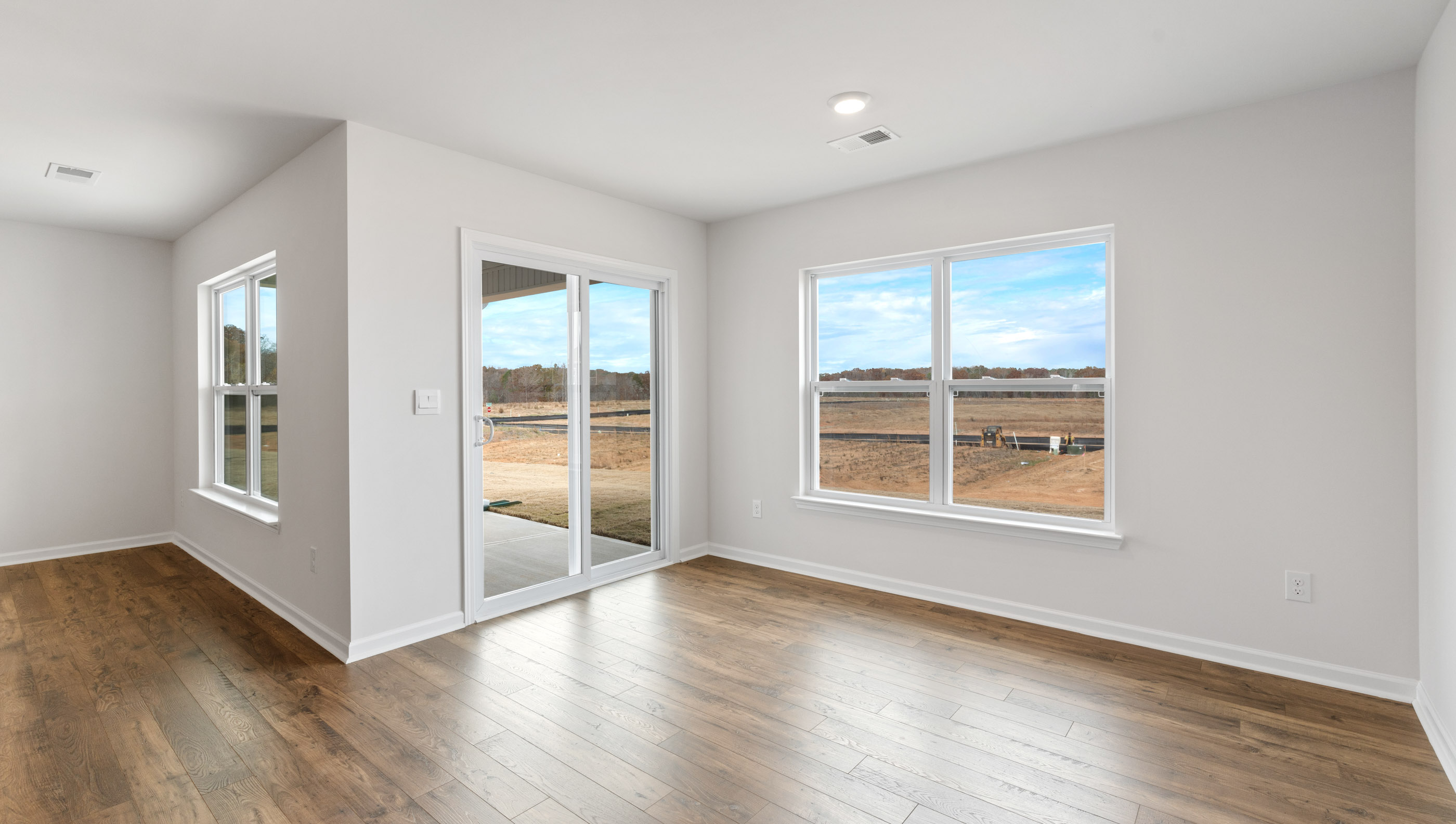 Family room with windows.