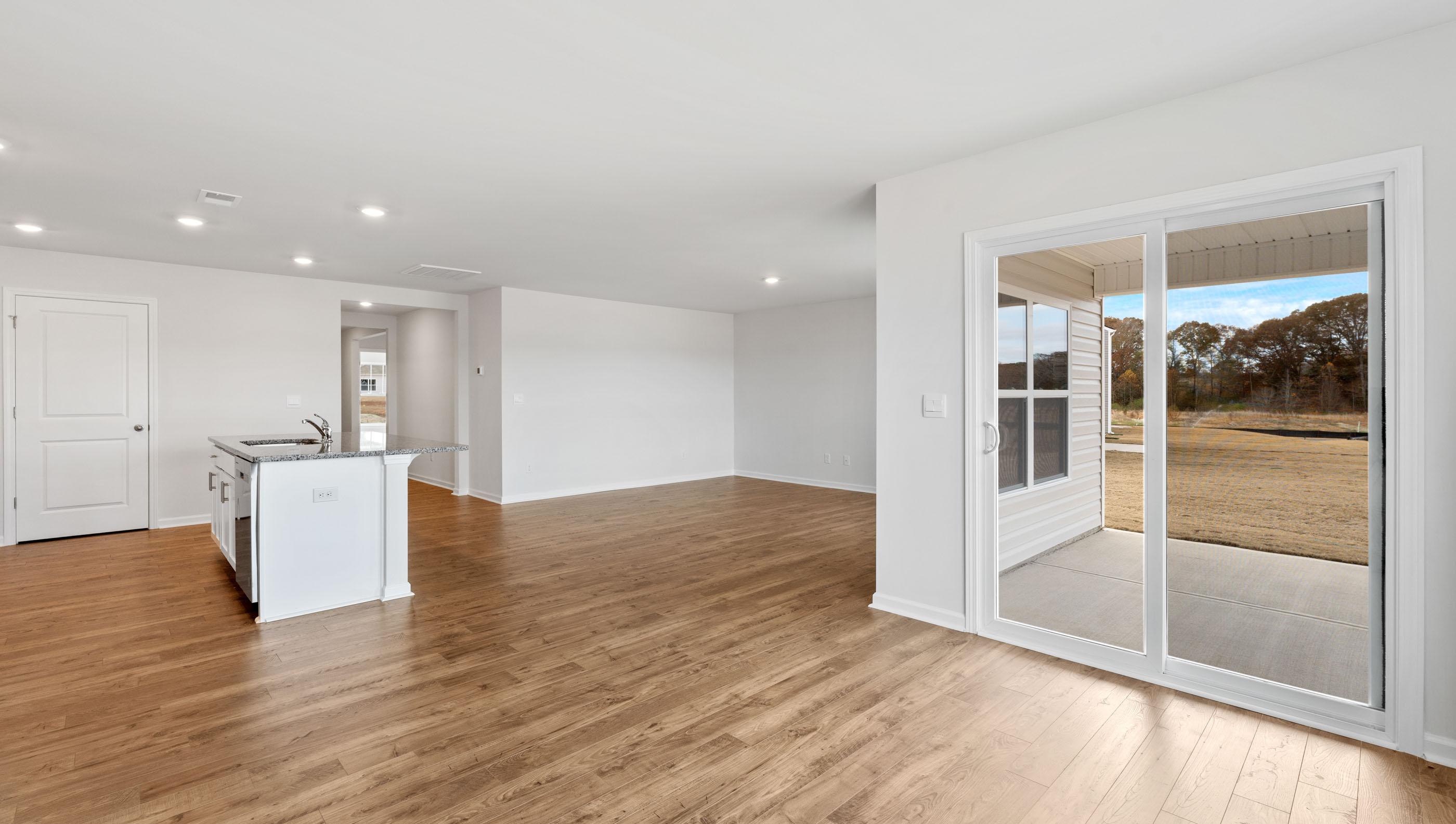 Family room with windows.