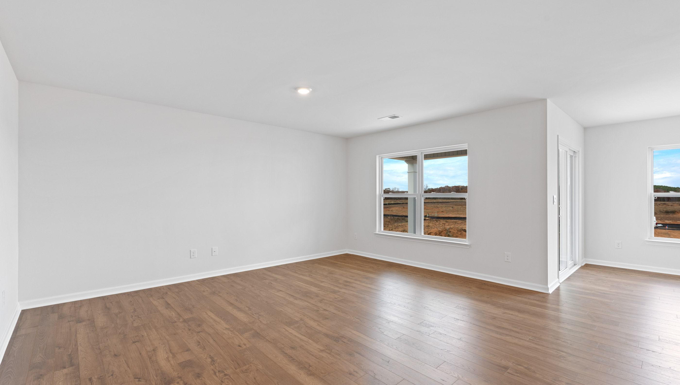 Family room with windows.