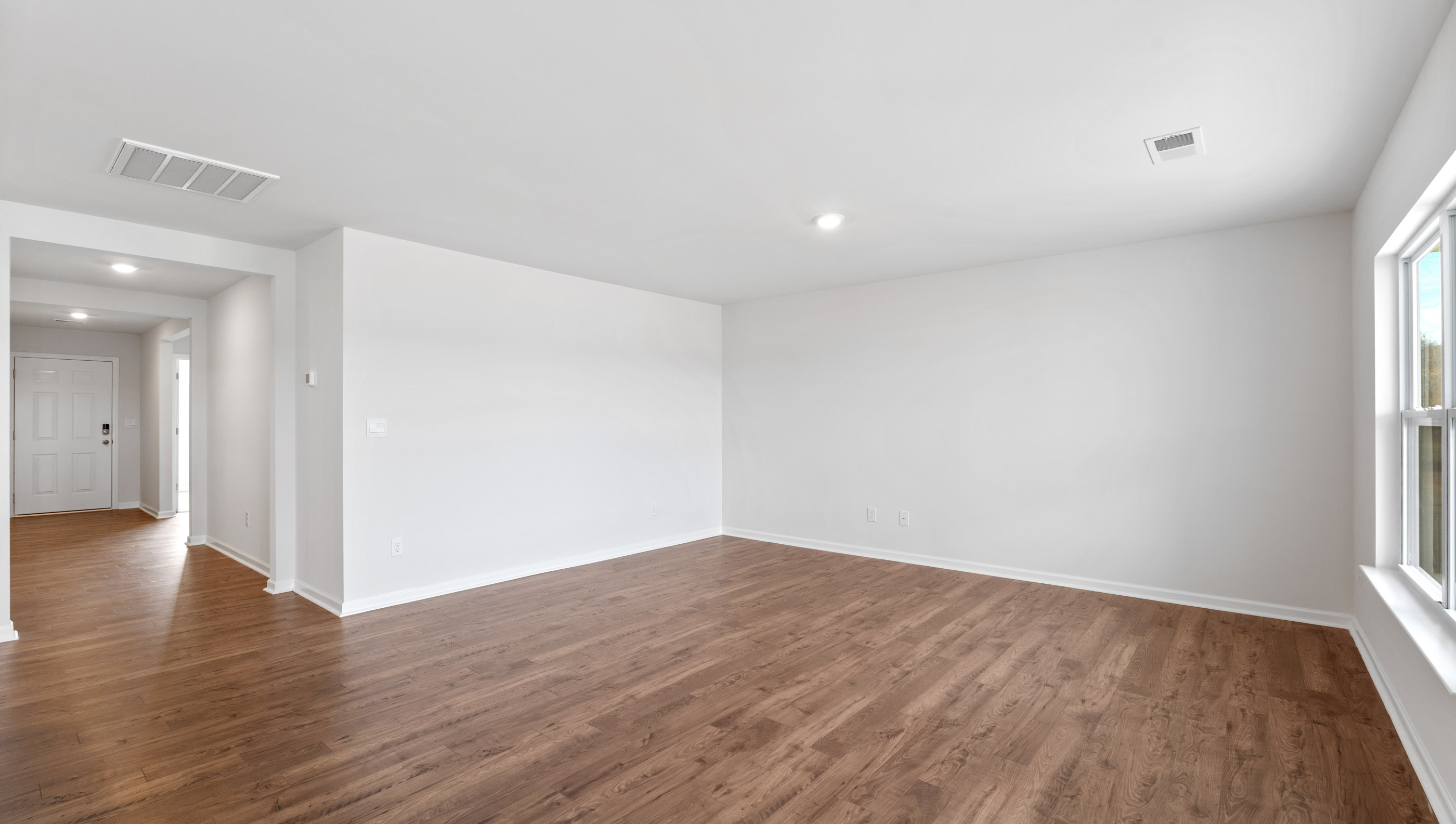 Family room with windows.