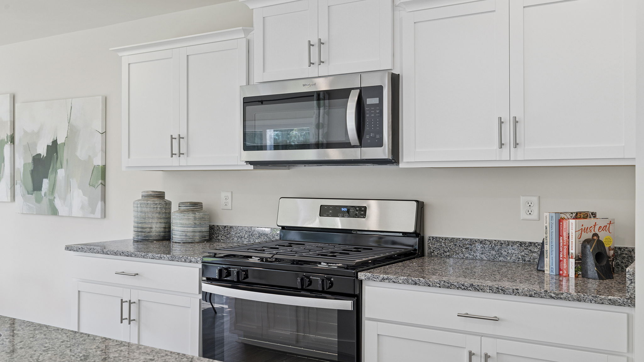 Kitchen with island and cabinets.