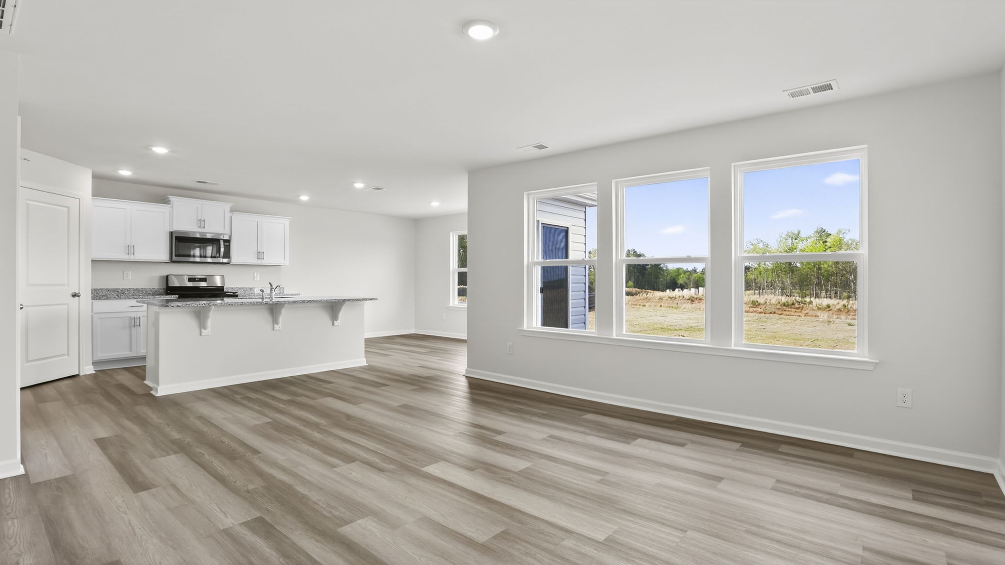 Family room with large windows.