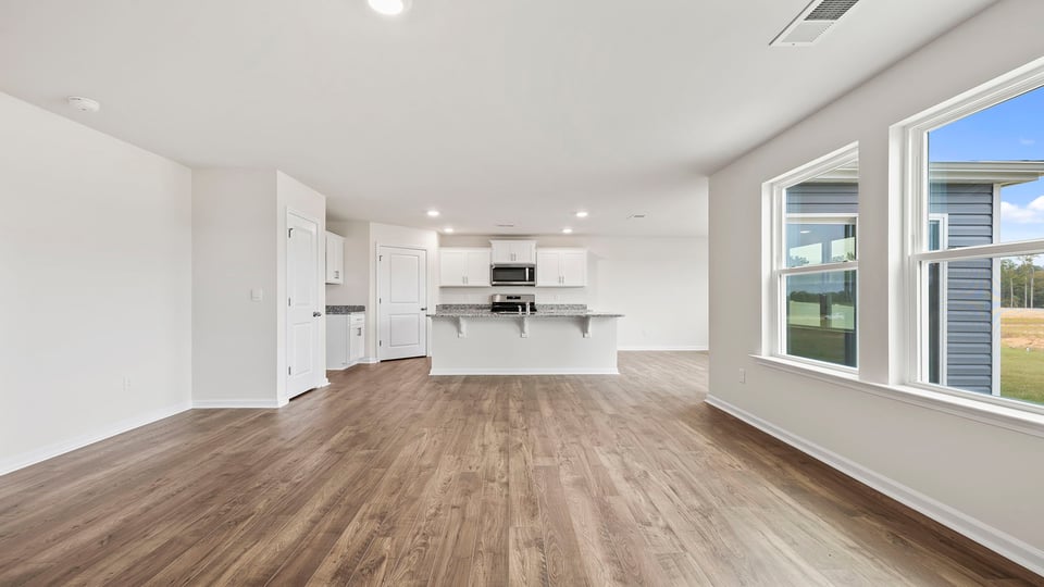 Open floor plan with lots of windows.