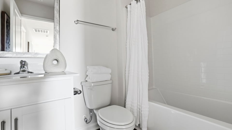 Bathroom with sink and tub.