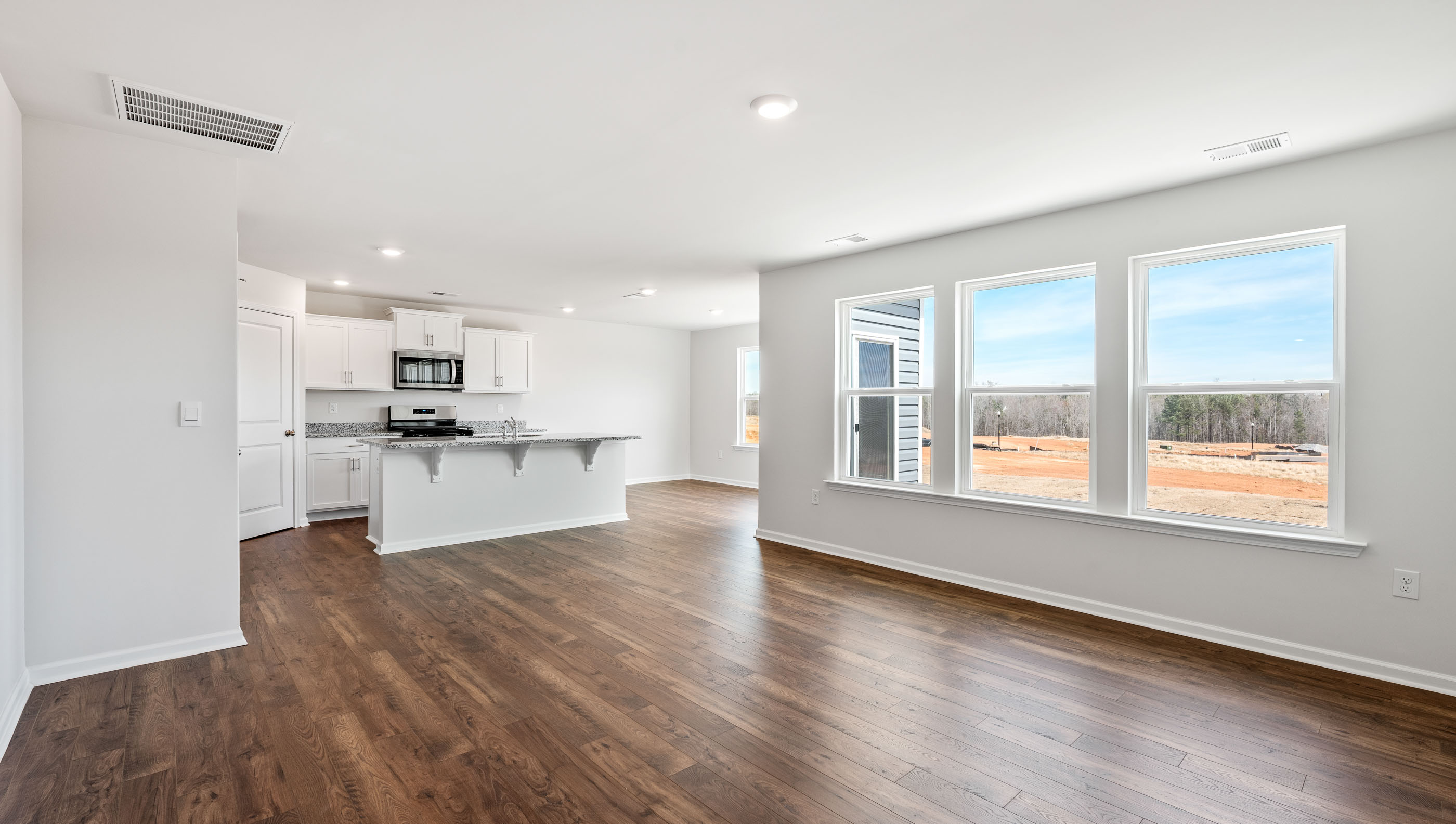 Family room with windows.