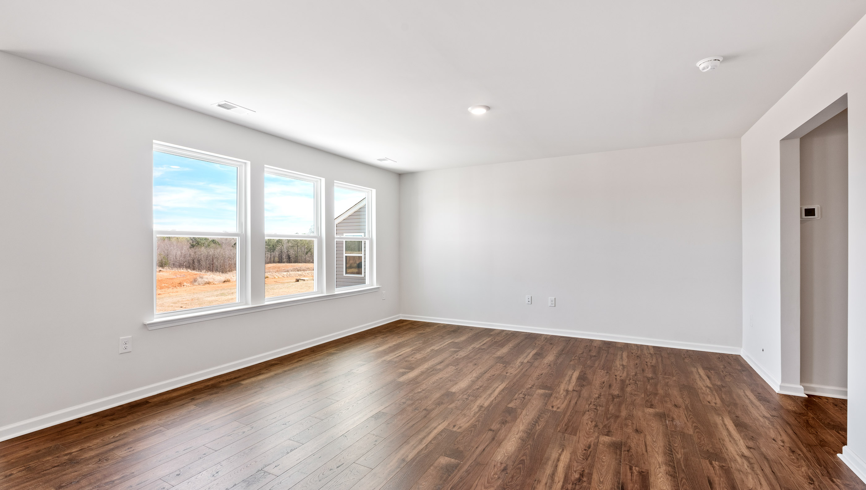 Family room with windows.