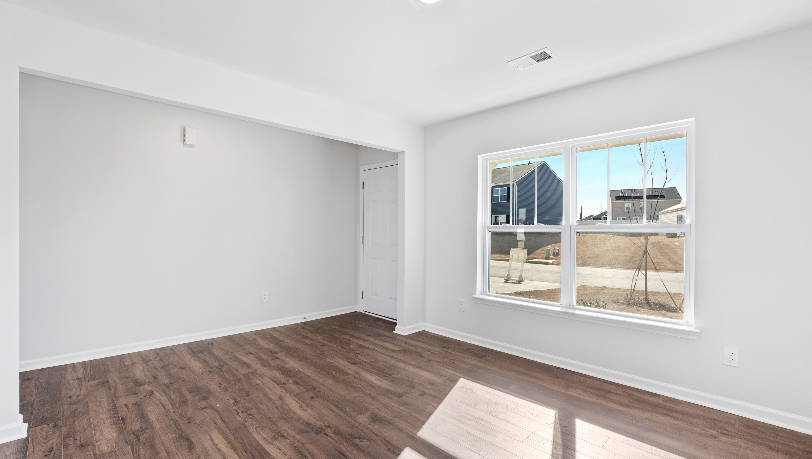 Family room with windows.