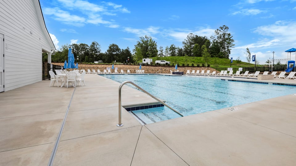 Pool amenity with chairs.