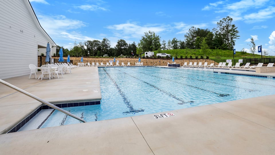 Pool amenity with chairs.