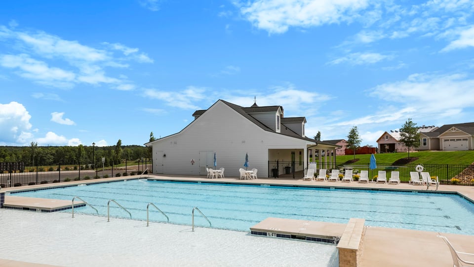 Pool amenity with chairs.