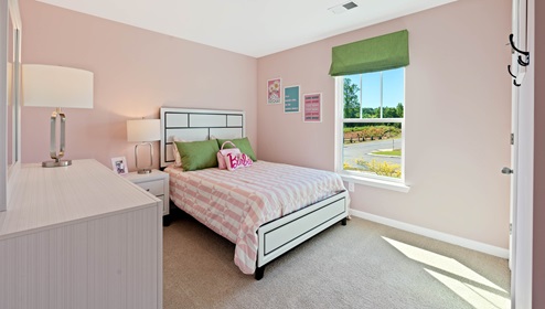 Bedroom with carpet.