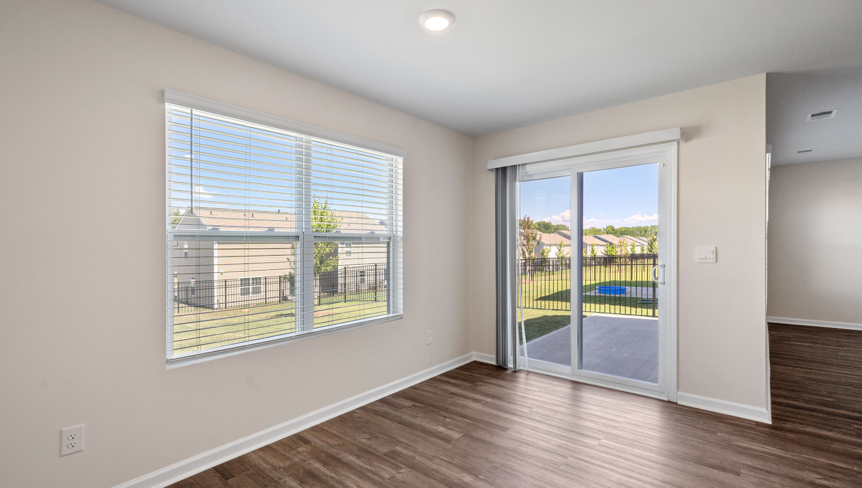 Dining room with sliding door to patio.