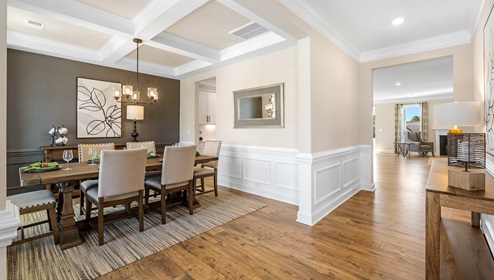 Entry way into home with dining area.