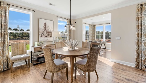 Dining area in the kitchen with door to backyard.
