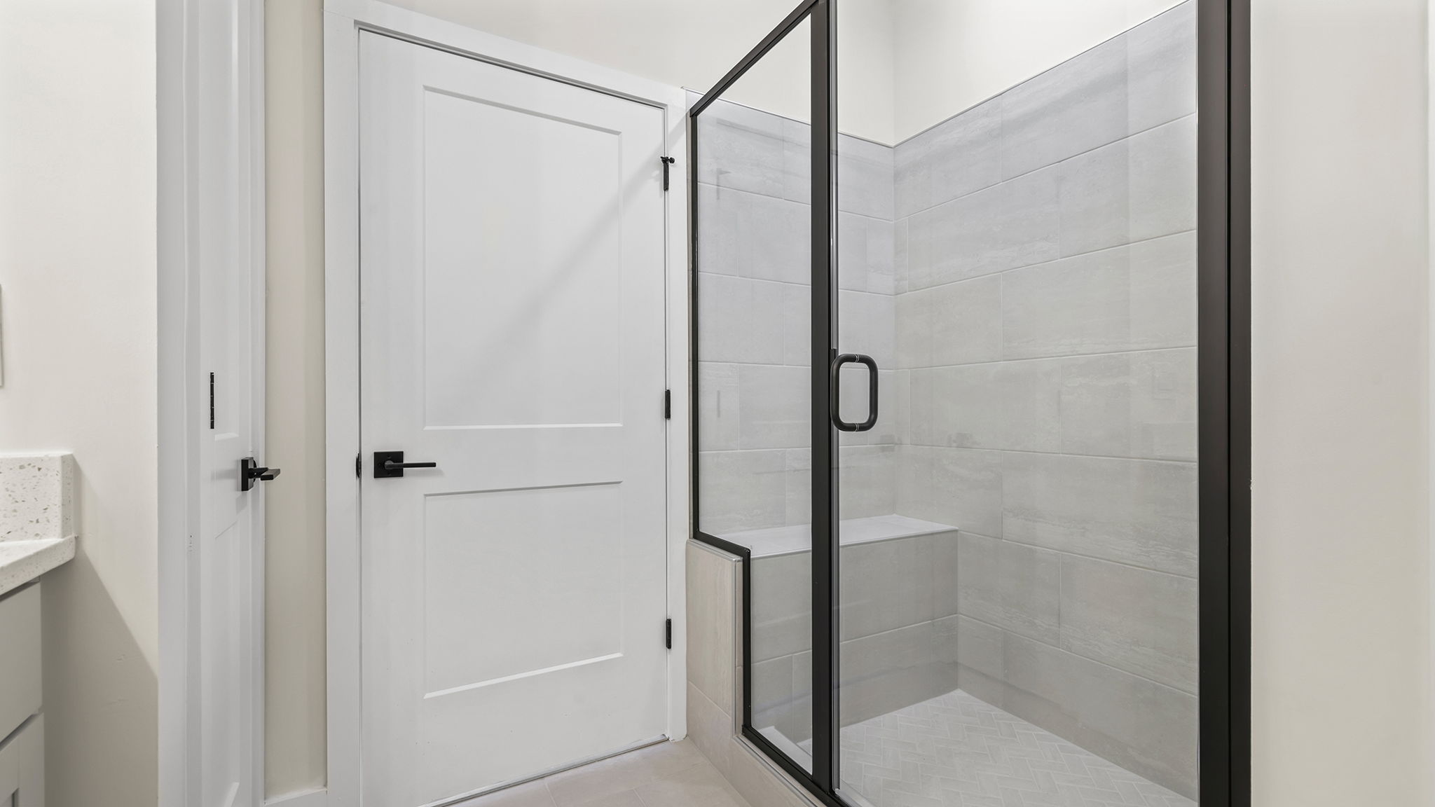 Primary bathroom walk-in shower.