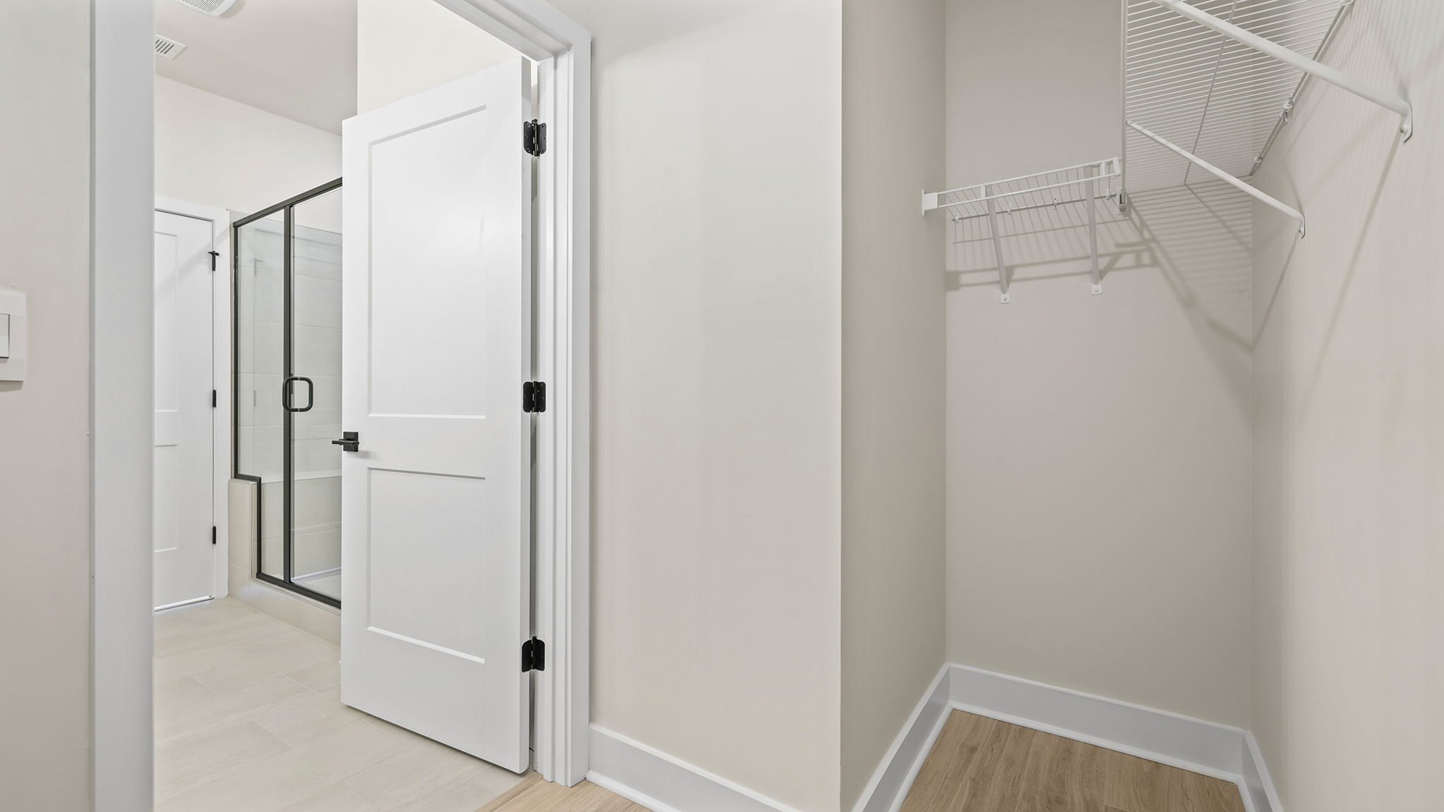 Primary bedroom walk-in closet.