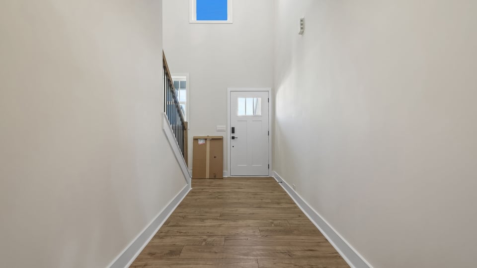 View of entrance and stairwell.